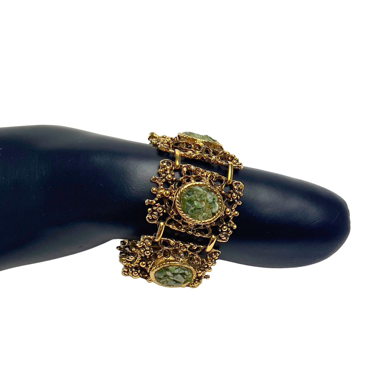 Very Ornate Gold Bracelet with Green Rock